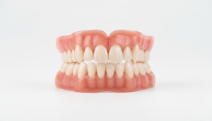 Natural-looking custom dentures from on-site denturist Michael Fijolek DD at Red Rose Dentistry Hamilton